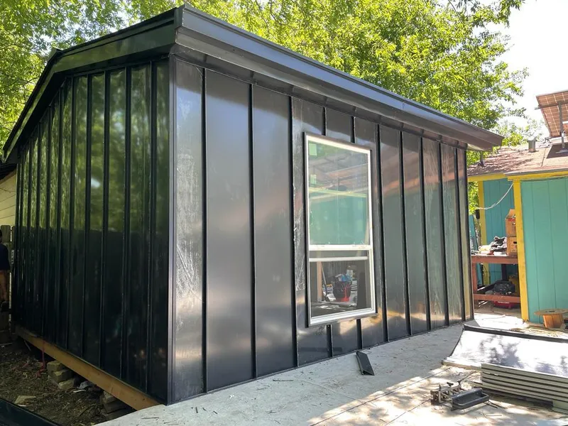 Black standing seam metal wall panels for Roof Inspection in Hibbing