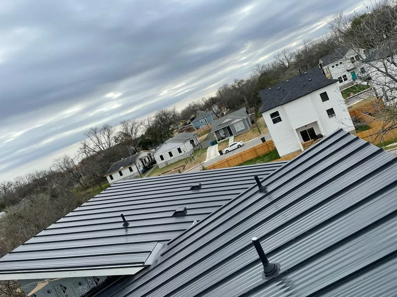 Standing seam metal roof panels with vents for Skylight Repair in Hibbing